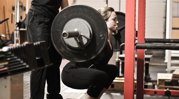 Emme Whiteman Squatting