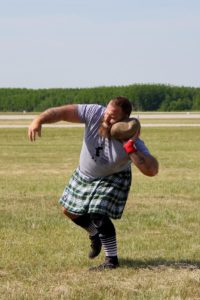 Zach Riley throws the stone June 18 in the Gaylord (Michigan) Highland Games and Air Show. Submitted